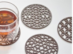 Kings of India walnut-stained coasters by Toronto-based Humble Raja reflect "geometric patterns inspired by Indian architectural screens."