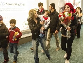 Kurdi family, refugees from Syria, arrive at YVR  in Vancouver, B.C., on December 28, 2015.