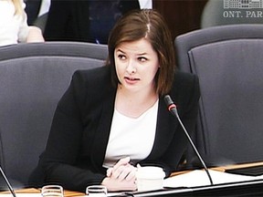 Laura Miller, shown testifying to an Ontario legislature committee, has quit as B.C. Liberal executive director after being hit with criminal charges.