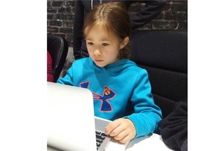 Lauren Semark-Schmoll, 8, of North Vancouver takes part in Codecreate in Gastown Saturday, meant to inspire kids to learn computer code.