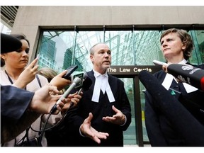Lawyers Mark Jette (left) and Marilyn Sandford speak to the media after John Nuttall and Amanda Korody were found guilty in 2015 in the B.C. Legislature Canada Day bomb plot.