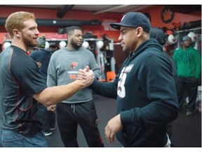 B.C. Lions quarterback Travis Lulay (left) re-signed with the team this week. Running back Andrew Harris (right) signed with the Winnipeg Blue Bombers.