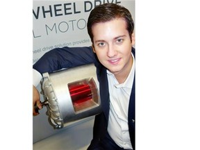Lithium X Energy Corp. president Brian Paes-Braga showed a Tesla car motor for which his firm hopes to help furnish battery power.