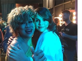 Luisa Marshall (as Tina Turner) poses with singer Selena Gomez after a taping of Ellen in October 2015.