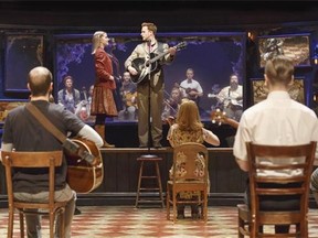 Main characters in the show Once: The Musical — Guy and Girl, centre — are played by Stuart Ward and Dani de Waal. Secondary characters remain onstage throughout to double as orchestra and company.