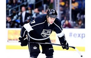 Milan Lucic #17 of the Los Angeles Kings lines up for a faceoff during a preseason game against the Arizona Coyotes at Staples Center on September 22, 2015 in Los Angeles, California.