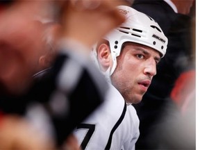 Milan Lucic #17 of the Los Angeles Kings watches from the penalty box during the first period of the NHL game against the Arizona Coyotes at Gila River Arena on December 26, 2015 in Glendale, Arizona.