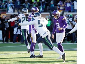 Minnesota Vikings kicker Blair Walsh (3) reacts after missing a field goal during the second half of an NFL wild-card football game against the Seattle Seahawks, Sunday, Jan. 10, 2016, in Minneapolis. The Seahawks won 10-9.