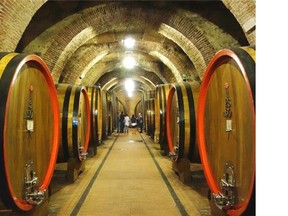 In Montepulciano, huge casks hold raw wine for at least a year so that the wine can pick up the personality of the wood as it ages.