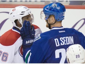 'It’s always fun to play these kinds of teams. They want to keep their winning streak going and we want to get a win at home, too,' says Vancouver Canucks winger Daniel Sedin, here exchanging pleasantries with star defenceman P.K. Subban during the Habs' visit last season to Rogers Arena.
