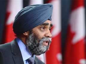 National Defence Minister Harjit Sajjan answers a question during a news conference Monday in Ottawa.