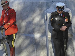 Thousands attend the annual Remembrance Day ceremonies, honouring Canada's military contributions and those who served, at Victory Square in VancouverNovember 11, 2014.