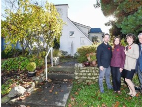 Heather Bell, left and her husband Andrew Stegemann, centre left, stand with her parents Richard Bell, centre right and Reni Kind, right in front of the home they will co-own on 22nd Avenue in Vancouver.
