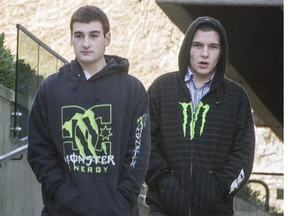 Matthew McRae, left, and his brother Daniel McRae, right, walk outside B.C. Supreme Court in Vancouver February 4, 2014. T