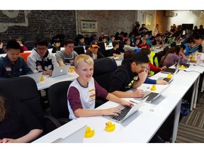 Dozens of kids take part in Codecreate, an event held in Gastown Saturday to inspire kids to learn computer code.