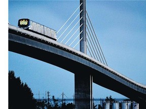 A Richmond-bound Canada Line train crosses the Fraser River bridge. Ice buildup along the Canada Line is being blamed for problems along the rapid transit line during the Monday morning commute.