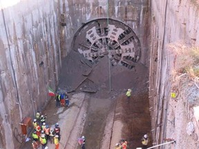 The tunneling machine dubbed Alice breaks out at the completion of the two kilometre border tunnel. part of the new TransLink Evergreen line in Coquitlam.