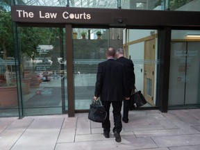 A B.C. mom is waging a court battle to halt a government-ordered review of a case in which her estranged husband was allowed unsupervised visits despite sexually abusing their children.