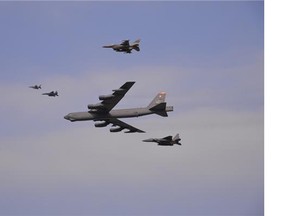 In this January 10, 2016 US Air Force handout photo, a US Air Force B-52 Stratofortress from Andersen Air Force Base, Guam, conducts a low-level flight in the vicinity of Osan Air Base, South Korea, in response to recent provocative action by North Korea.