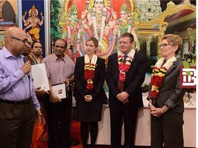 The Premier of Ontario Kathleen Wynne, right, shown in this photo alongside Nehru Gunaratnam, former spokesman for the World Tamil Movement, left, along with city councillor Michelle Berardinetti and MPP Lorenzo Berardinetti at an event at the Kanthasamy Hindu Temple.