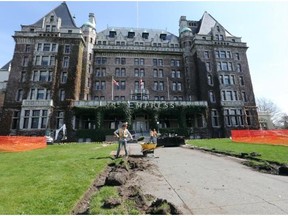 The chainsaws were going full bore Thursday at the Empress Hotel, as workers felled an enormous but unhealthy arbutus tree as part of a garden revamp.