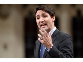 Prime Minister Justin Trudeau says the Tories are "out of touch" with Canadians over tax-free savings account contributions. Interim Conservative leader Rona Ambrose questioned Trudeau on reducing the annual limit to $5,500 from $10,000.