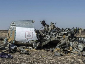 Debris of the A321 Russian airliner lie on the ground a day after the plane crashed in Wadi al-Zolomat, a mountainous area in Egypt's Sinai Peninsula, on November 1, 2015. International investigators began probing why the Russian airliner carrying 224 people crashed in the Sinai Peninsula, killing everyone on board, as rescue workers widened their search for missing victims.