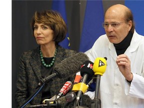 French Health Minister Marisol Touraine, left, and Professor Gilles Edan, the chief neuroscientist at Rennes Hospital, address the media during a press conference on Friday, Jan. 15, 2016.