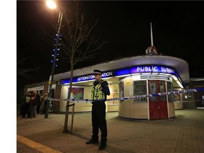 Police cordon off Leytonstone Underground Station in east London following a stabbing incident, Saturday Dec. 5, 2015.