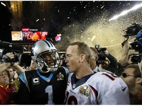 Cam Newton #1 of the Carolina Panthers and Peyton Manning #18 of the Denver Broncos speak on the field after Super Bowl 50 at Levi’s Stadium on February 7, 2016 in Santa Clara, California.