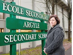 Cyndi Gerlach, North Vancouver school board chair, poses for a photo outside Argyle Secondary School in North Vancouver, BC, November, 13, 2015.  She is hoping that the money saved from closing schools will enable them to rebuild Argyle.