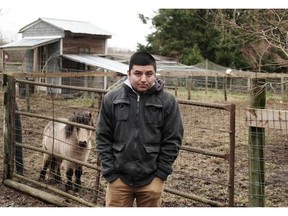 Omar Figueroa Ramirez on the blueberry farm where he worked in Langley. He is seeking $20,000 in back pay.