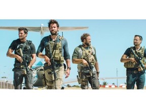 Pablo Schreiber, left, John Krasinski, David Denman and Dominic Fumusa in 13 Hours: The Secret Soldiers of Benghazi.