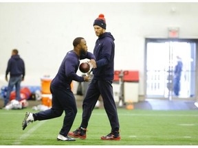 Patriots quarterback Tom Brady hands off the ball to running back James White during practice Tuesday in Foxborough, Mass., where the home team poses a near-unbeatable challenge.