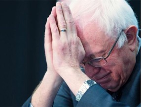 Playing to the religious vote: Democratic presidential candidate, Bernie Sanders, a non-practising Jew, bows his head during a prayer at a breakfast with faith leaders.