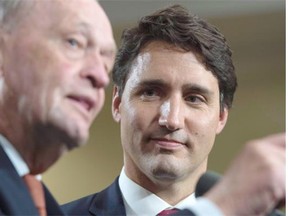 Prime minister-designate Justin Trudeau, right, might be wise to steal a page from the book of former prime minister Jean Chretien, who once declared he had delivered on 78 per cent of his campaign promises, which was ‘not a bad score.’