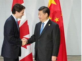 Prime Minister Justin Trudeau is greeted by Chinese President Xi Jinping as they take part in a bilateral meeting during the G20 Summit in Turkey last month.