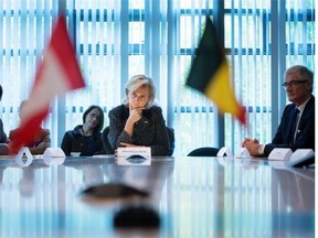 Princess Astrid of Belgium, centre, listens to a presentation at hydrogen fuel cell manufacturer Ballard Power Systems in Burnaby Tuesday.