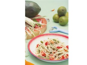Putting together this Green Papaya Salad involves a little pounding of the mortar and pestle.