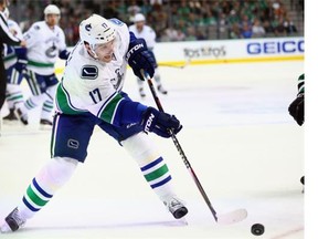 Radim Vrbata #17 of the Vancouver Canucks skates the puck against the Dallas Stars in the second period at American Airlines Center on October 29, 2015 in Dallas, Texas.