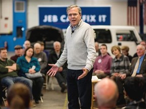 Republican candidate Jeb Bush meets New Hampshire voters at a meeting in Nashua last week. Bush said he will continue to call Trump out for his ‘outrageous comments.’