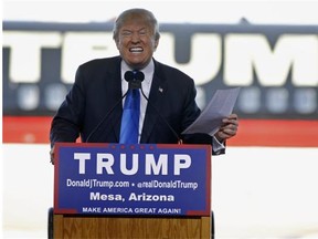 Republican presidential candidate Donald Trump speaks in Arizona this week. A majority of Canadians want his name removed from skyskrapers in Toronto and Vancouver.