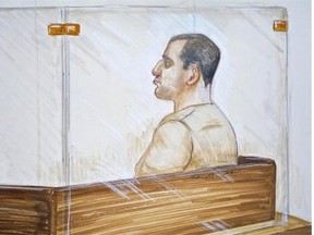 Reza Moazami is shown the prisoner’s box. He has been sentenced to serve another 17 years and 339 days in prison.