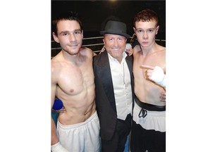 Ring announcer Jim Crescenzo feted Ben Falconer and his boys’ club member Rhett Gibbons after they fought to a draw in the city welterweight title bout.