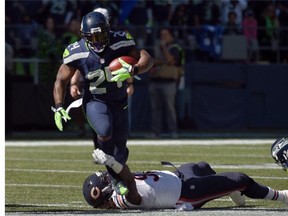 Running back Marshawn Lynch of the Seattle Seahawks runs with the ball during the second quarter of their game against the Chicago Bears at CenturyLink Field on Sept. 27, 2015 in Seattle.