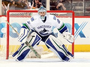 Ryan Miller #30 of the Vancouver Canucks gets ready to make a save against the Arizona Coyotes at Gila River Arena on February 10, 2016 in Glendale, Arizona.