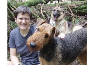 Sarah Townsend with her Airedale Tuku, and her partner’s dog Bridie in the background.