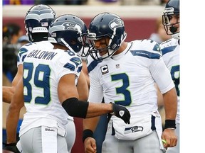 Seattle Seahawks quarterback Russell Wilson is distributing the ball to playmakers like receiver Doug Baldwin with efficiency and accuracy.