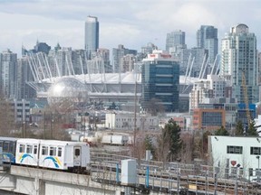 FILE — The SkyTrain leaves downtown Vancouver.