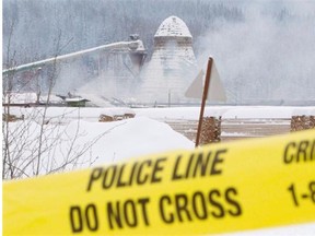 Smoke rises from the burned out Babine Forest Products mill in Burns Lake in January 2012.